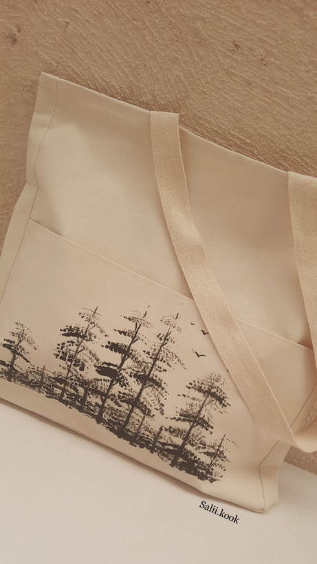 توت بگ آستردار پارچه ای جیب دار طرح کاج